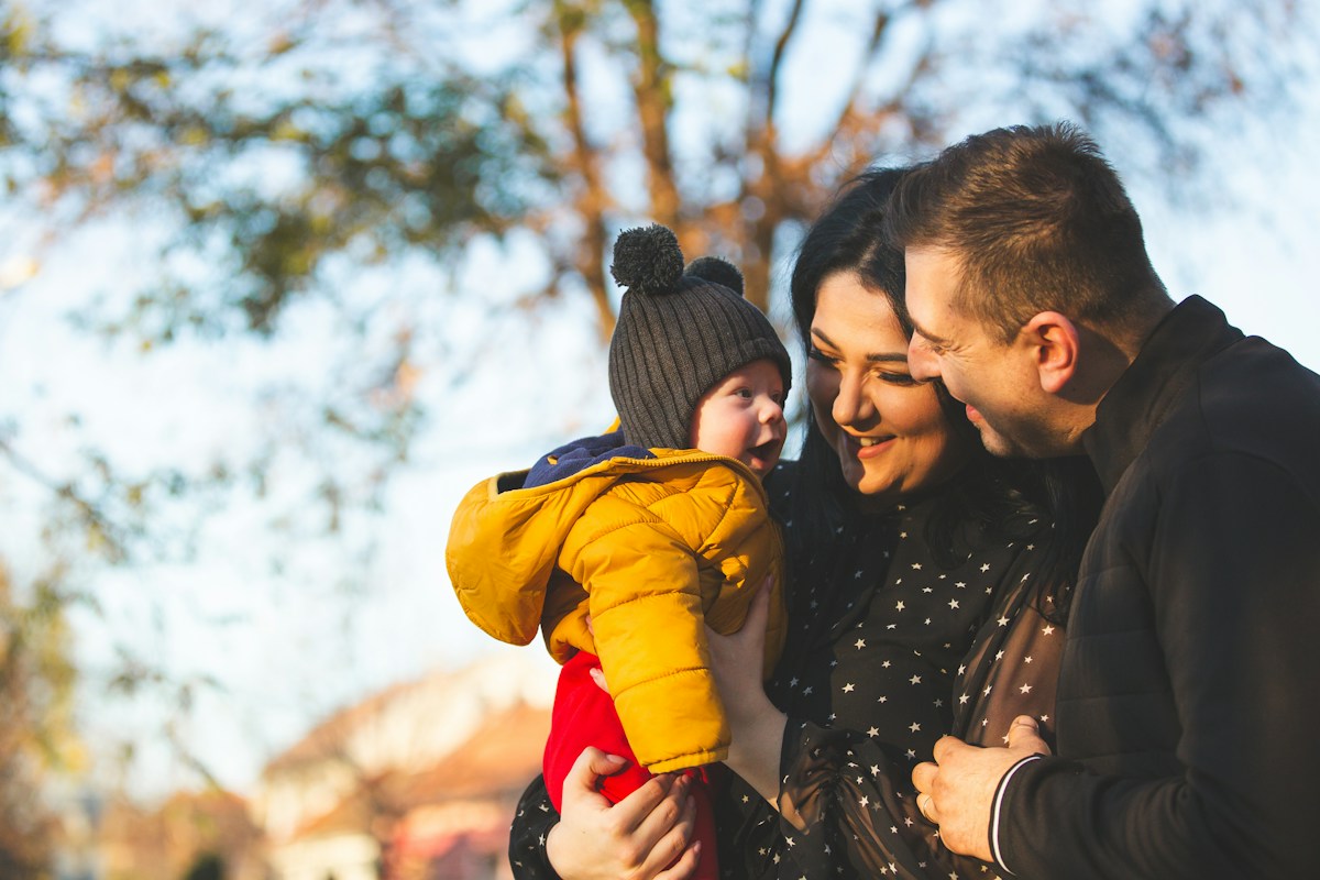 A family spending a happy afternoon together outdoors